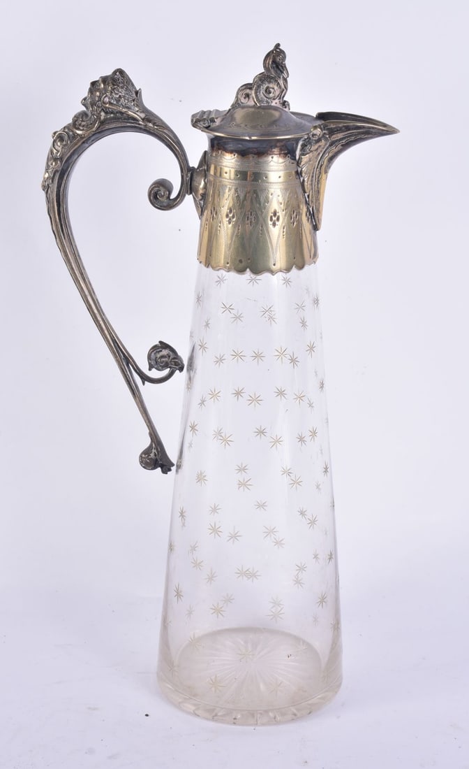 A VICTORIAN SILVER PLATED GLASS CLARET JUG. 32 cm high. (1 of 6)