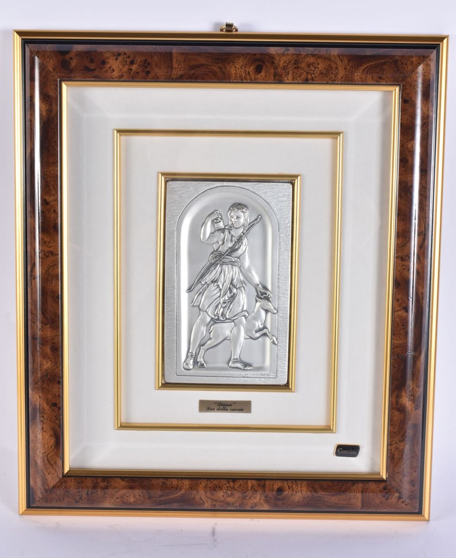 A FRAMED SILVER GILT REPOUSSE PLAQUE. 38 cm x 30 cm. (1 of 4)