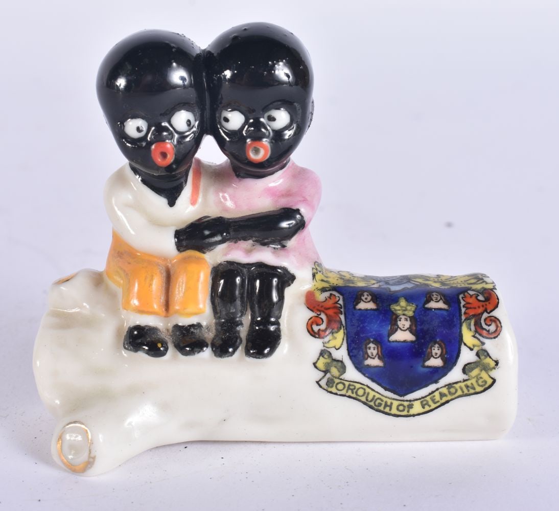 AN ARCADIA BOROUGH OF READING CRESTED WARE FIGURE. 9 cm x 8 cm. (1 of 5)