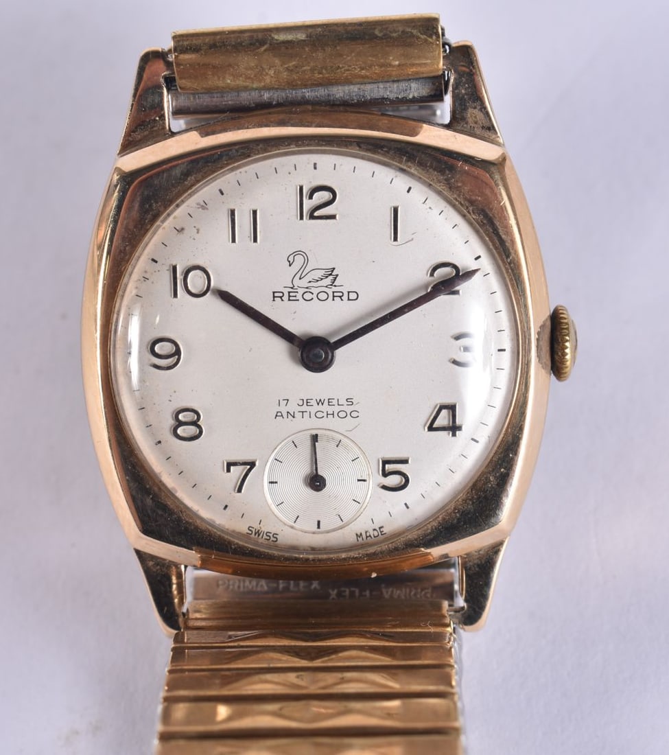 A 9CT GOLD RECORD WRISTWATCH. Not running. 54 grams overall. 3 cm wide. (1 of 5)