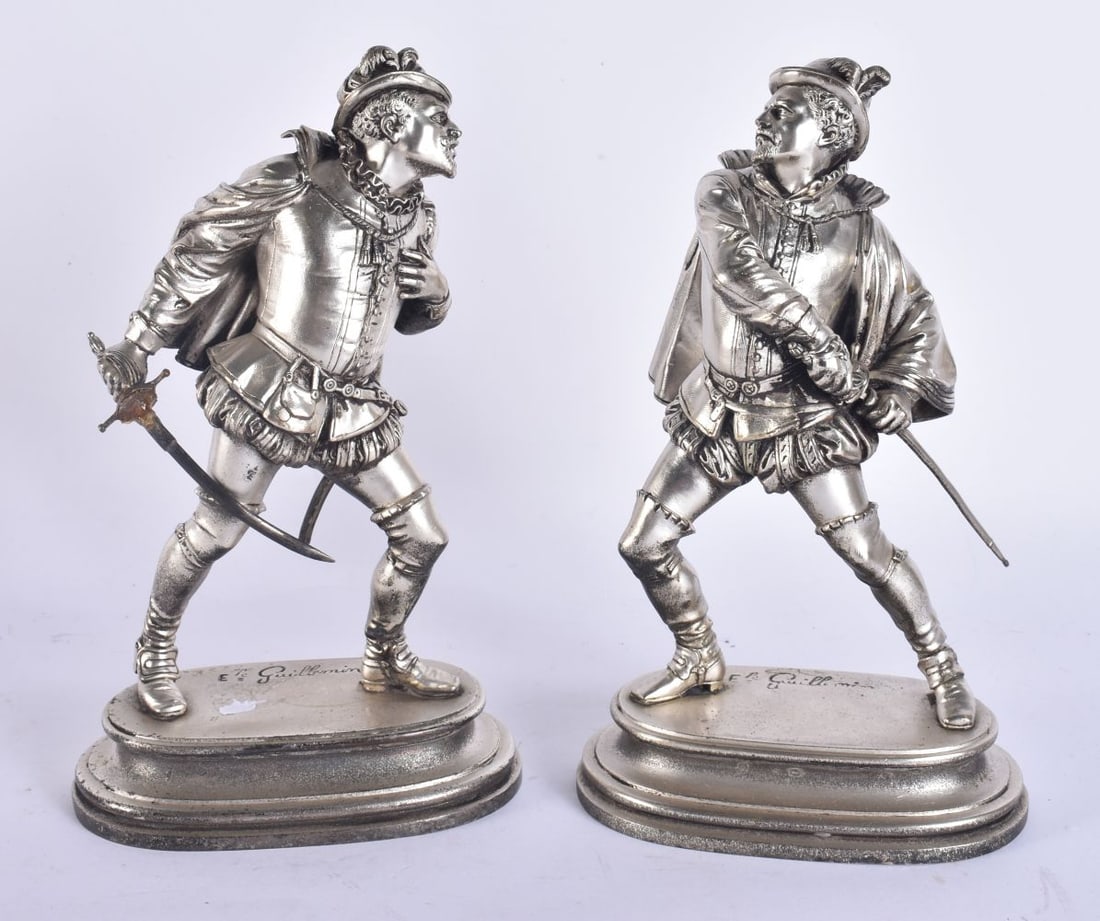 A PAIR OF ANTIQUE SILVERED BRONZE FIGURES. 23 cm high. (1 of 7)