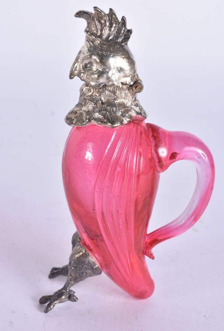 A SILVER PLATED COCKATOO MINIATURE GLASS DECANTER. 13 cm high. (1 of 5)