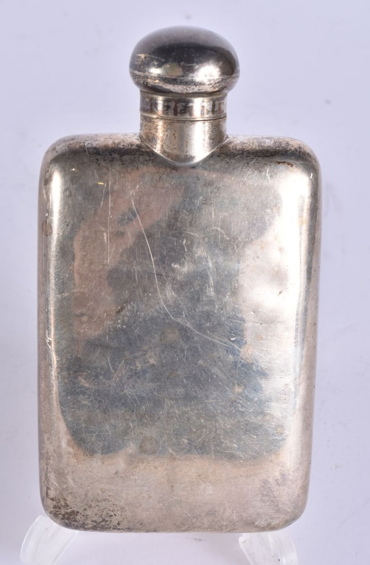 A SILVER HIP FLASK. 152 grams. 14.5 cm x 7.5 cm. (1 of 4)