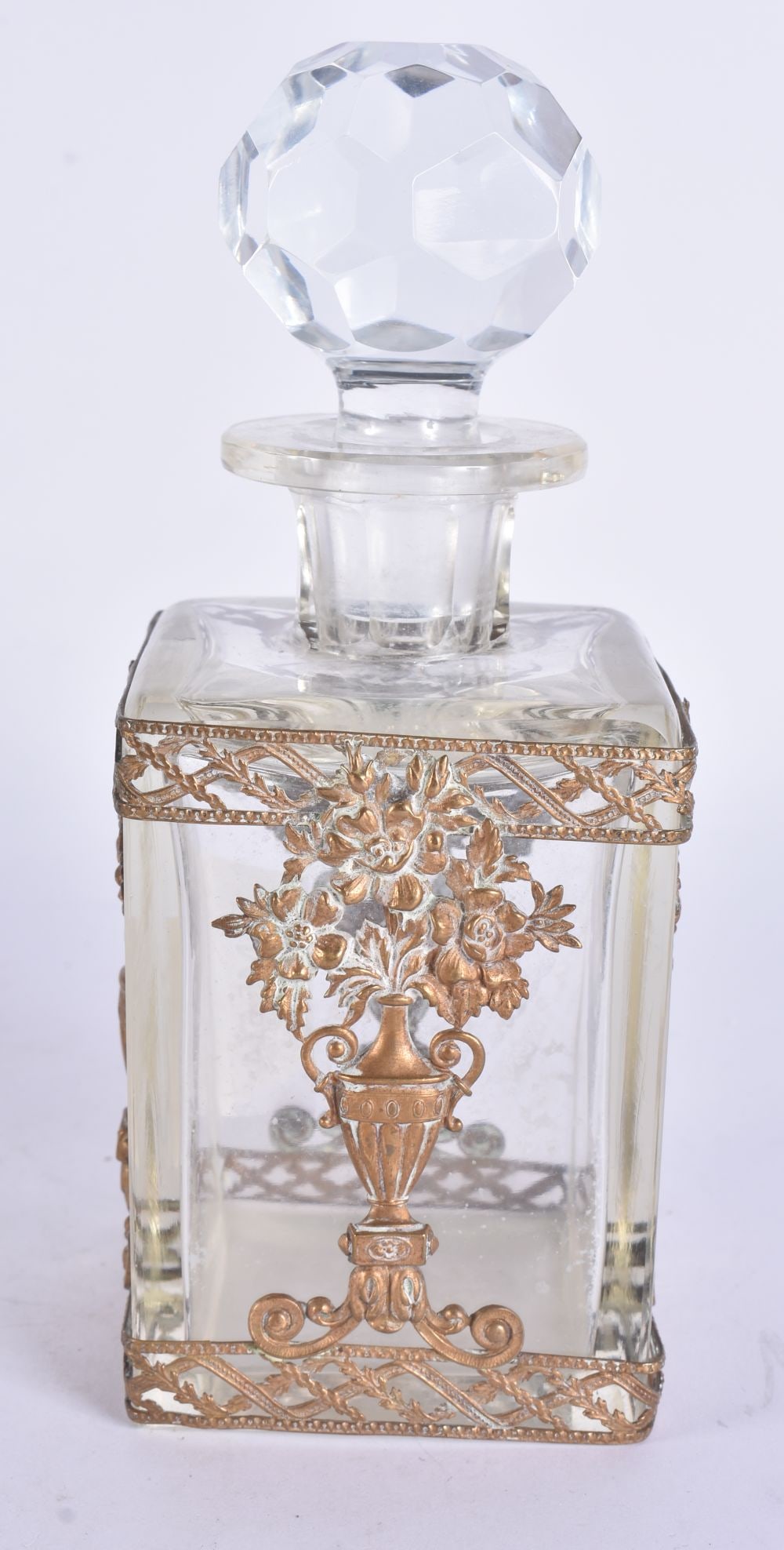 A GILT METAL OVERLAID GLASS SCENT BOTTLE AND STOPPER. 18 cm high. (1 of 5)
