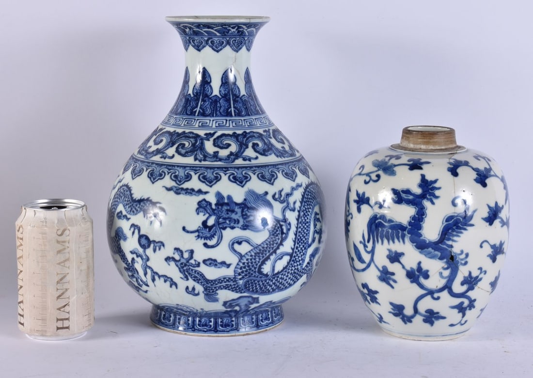 A 19TH CENTURY CHINESE BLUE AND WHITE PORCELAIN PHOENIX JAR bearing Kangxi marks to base, together w (1 of 10)