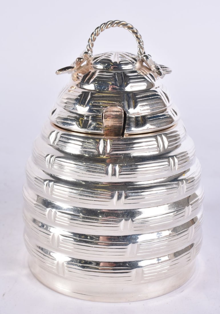 A SILVER PLATED BEEHIVE PRESERVE POT. 12.5 cm high. (1 of 5)