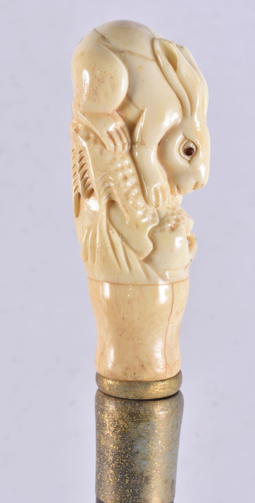 A CONTINENTAL CARVED BONE WALKING CANE. 90 cm long.: A CONTINENTAL CARVED BONE WALKING CANE. 90 cm long.