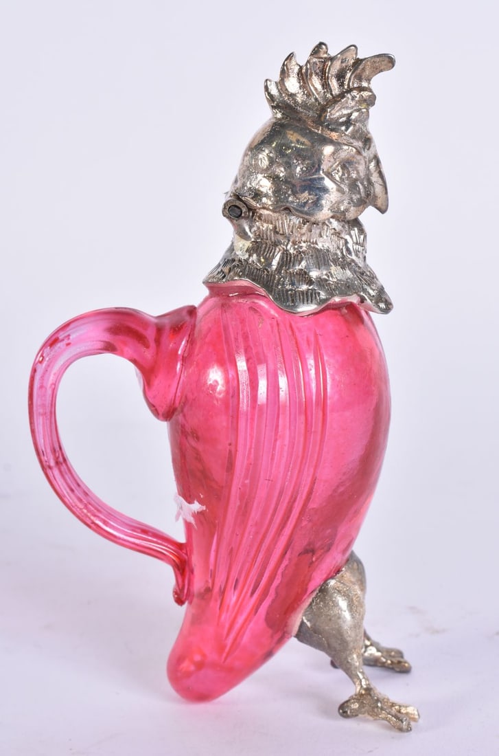 A SILVER PLATED BIRD LIQUOR JUG. 13 cm high. (1 of 5)