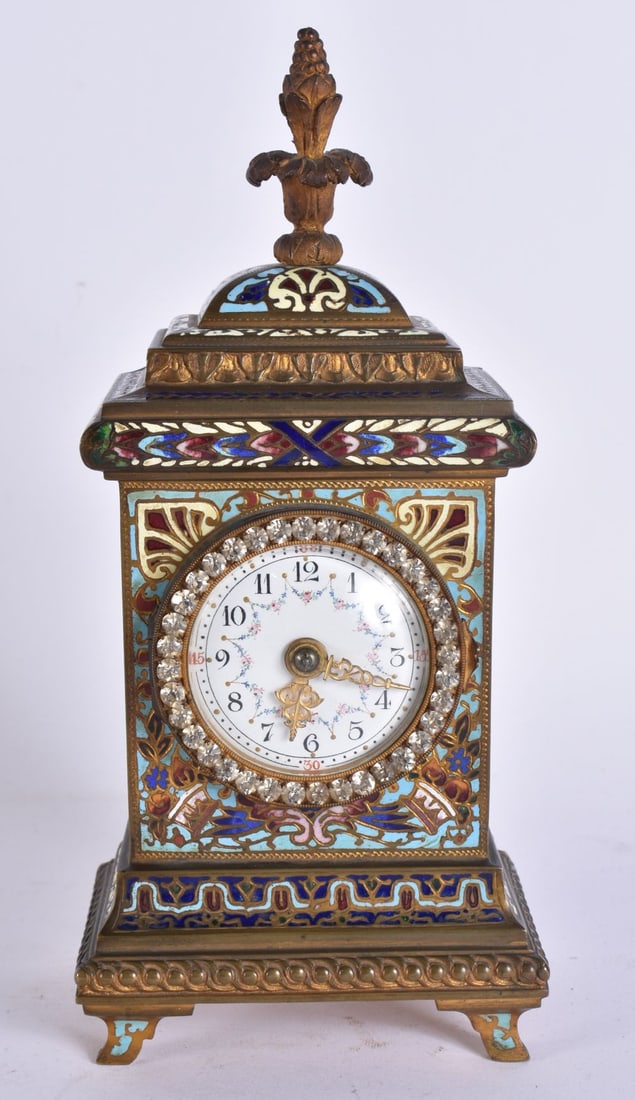 A 19TH CENTURY FRENCH CHAMPLEVE ENAMEL BRONZE CLOCK with diamonte dial. 20.5 cm high. (1 of 7)