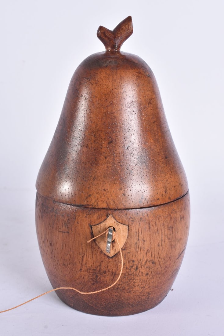 A FRUITWOOD TREEN TEA CADDY. 19 cm high. (1 of 5)