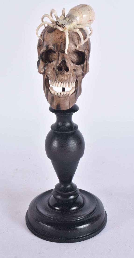 A MEMENTO MORI CARVED SKELETON SKULL AND SPIDER FIGURE. 25.5 cm high. (1 of 4)