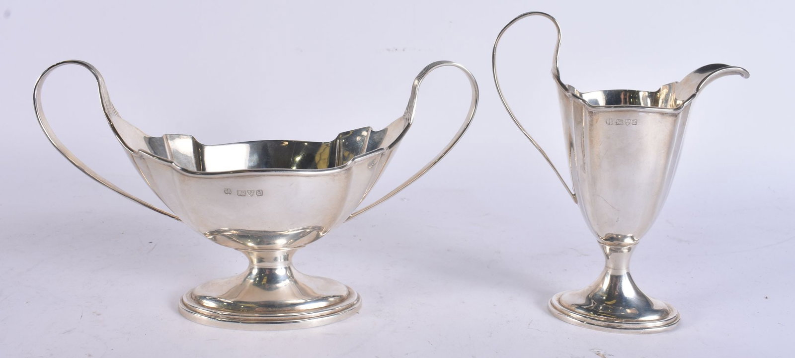 A SILVER CREAM JUG AND SUGAR BASIN. 264 grams. Largest 18.5 cm wide. (2) (1 of 7)