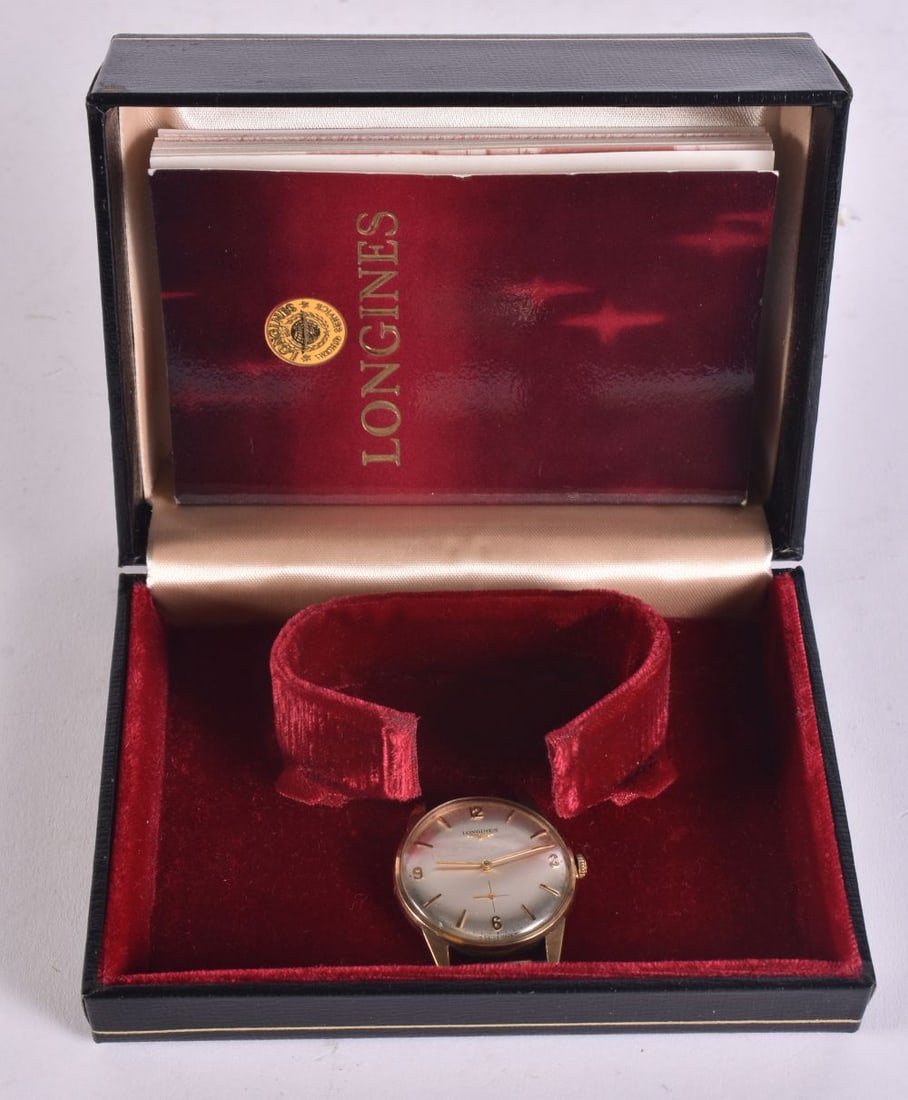 A 9CT GOLD LONGINES WATCH. Running. 22.3 grams. 3.25 cm wide. (1 of 4)