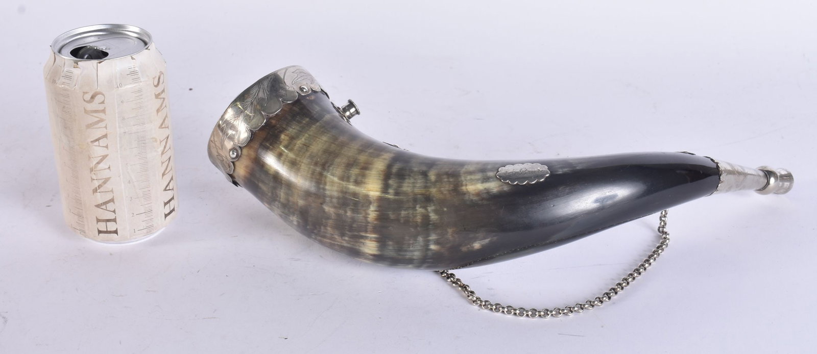 A VICTORIAN SCOTTISH WHITE METAL MOUNTED CAIRNGORM POWDER FLASK with hanging strap. 32 cm wide. (1 of 6)