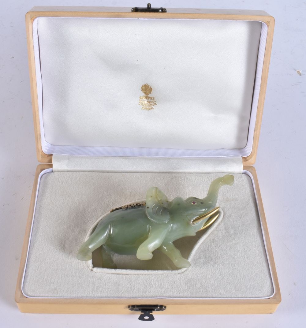 A CONTINENTAL SILVER GILT RUBY AND JADE ELEPHANT. 10.5 cm wide. (1 of 5)