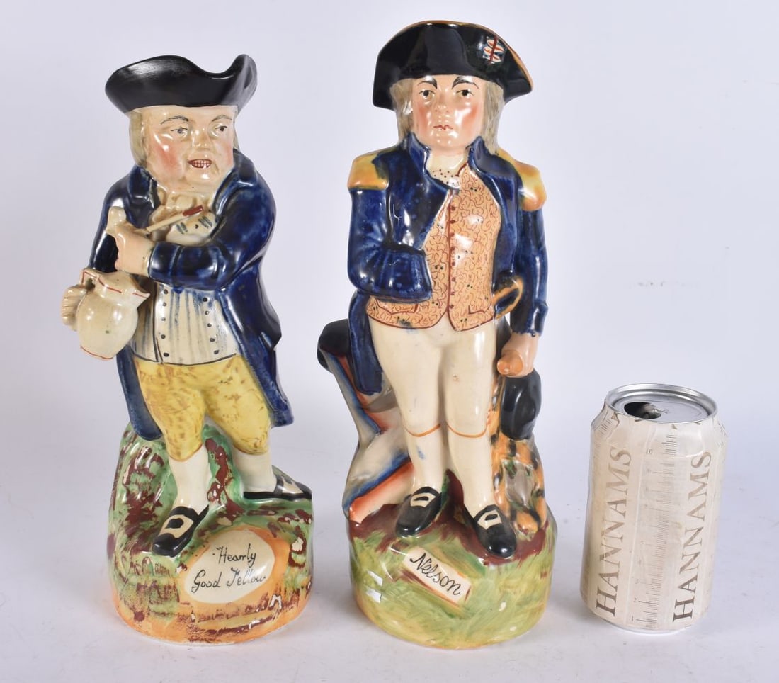 A LARGE NEAR PAIR OF CONTINENTAL POTTERY CHARACTER JUGS. Largest 30 cm high. (1 of 7)