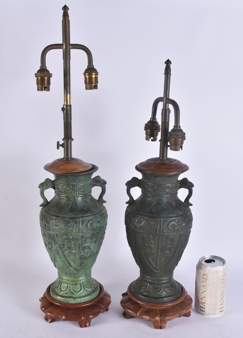 A PAIR OF CHINESE ARCHAIC STYLE TWIN HANDLED BRONZE LAMPS. 58 cm high overall. (1 of 6)