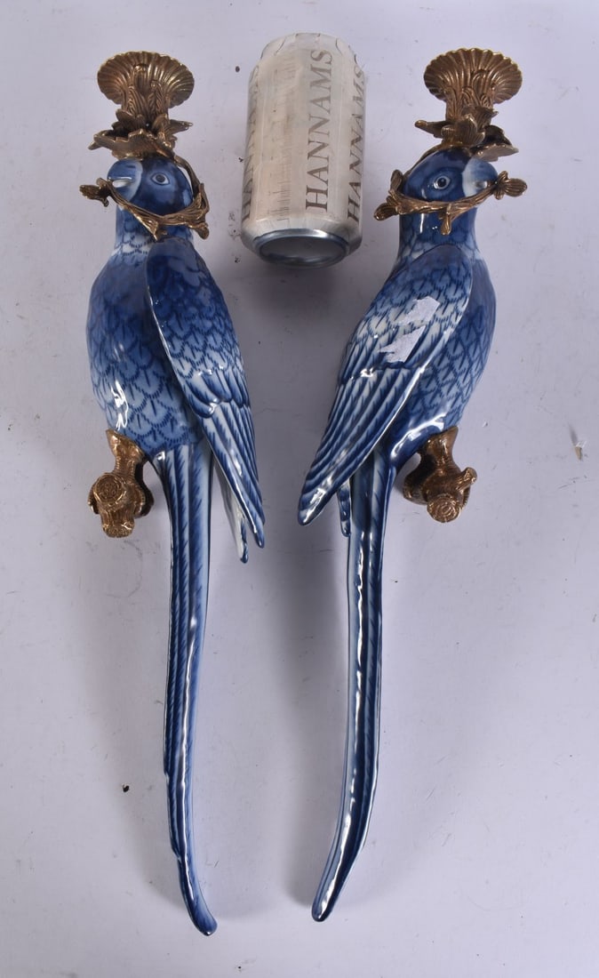 A PAIR OF PARROT POTTERY BRONZE WALL SCONCE CANDLESTICKS. 50 cm long. (1 of 4)