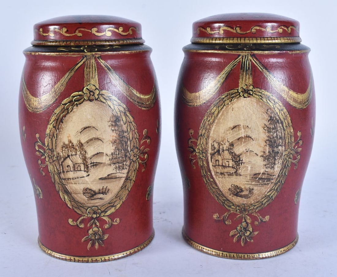A PAIR TOLE STYLE TEA CANISTERS AND COVERS. 18 cm high. (1 of 4)