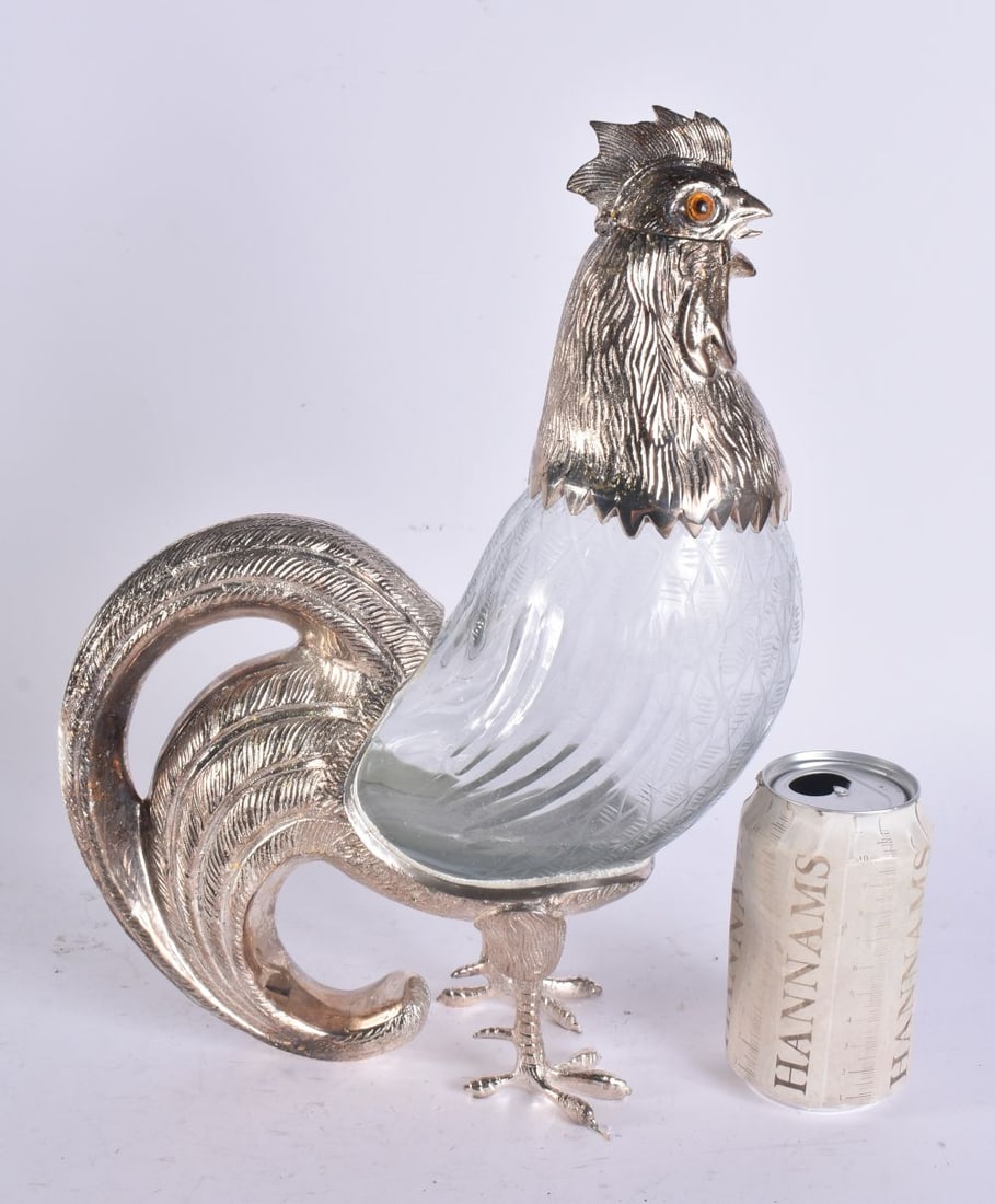 A SILVER PLATED GLASS COCKERELL DECANTER. 34 cm x 18 cm.: A SILVER PLATED GLASS COCKERELL DECANTER. 34 cm x 18 cm.