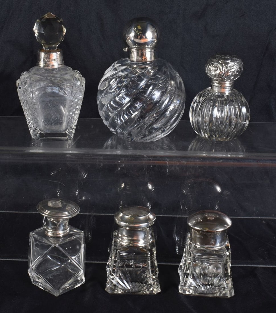 SIX ANTIQUE SILVER MOUNTED SCENT BOTTLES. (6) (1 of 5)
