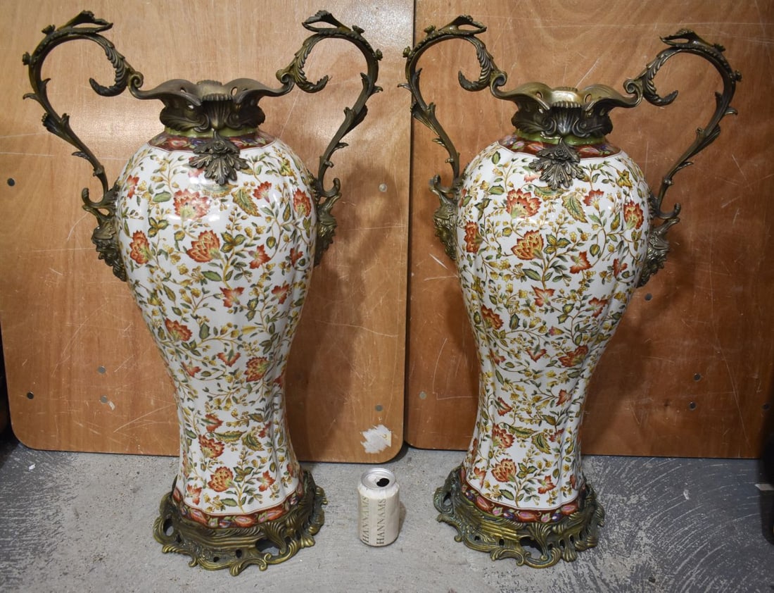 A LARGE PAIR OF CONTINENTAL TWIN HANDLED POTTERY VASES with bronze mounts. 80 cm x 44 cm. (1 of 10)