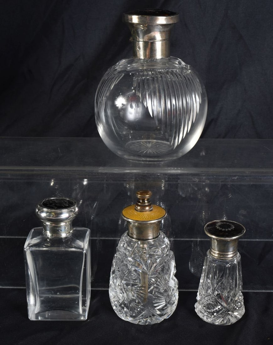 THREE ANTIQUE SILVER AND TORTOISESHELL SCENT BOTTLES together with a silver and enamel bottle. Large (1 of 6)