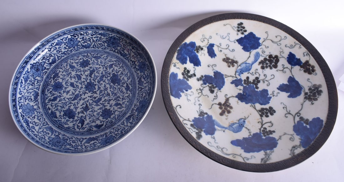 A LARGE 19TH CENTURY CHINESE BLUE AND WHITE CRACKLE GLAZED DISH together with a blue and white dish. (1 of 4)