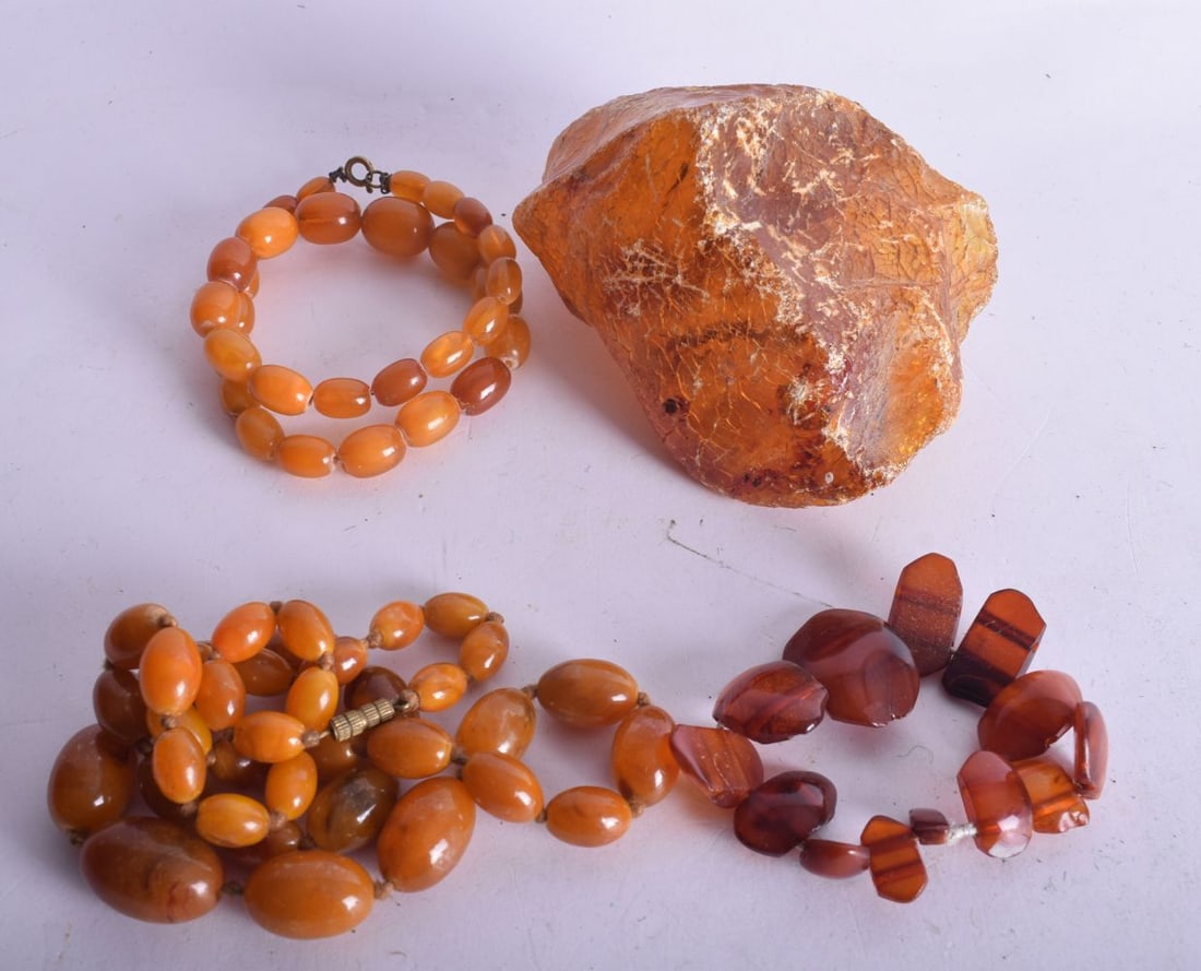 AN AMBER BOULDER etc. Largest 60 cm long. (4) (1 of 5)