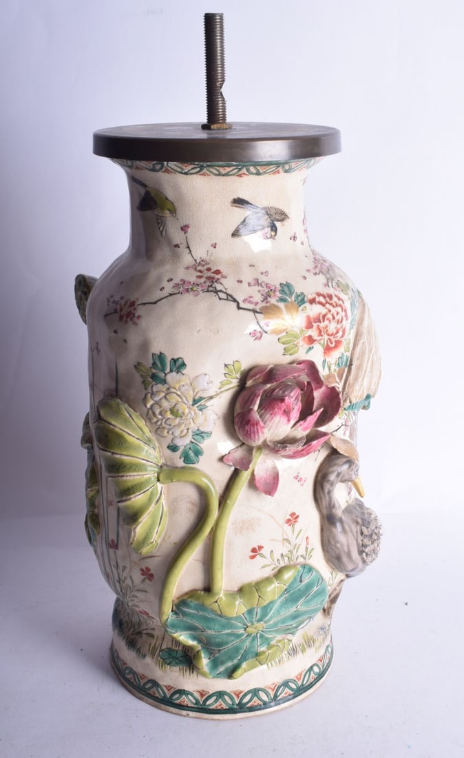 A LATE 19TH CENTURY JAPANESE MEIJI PERIOD SATSUMA VASE decorated in relief with a bird and flowers. (1 of 7)