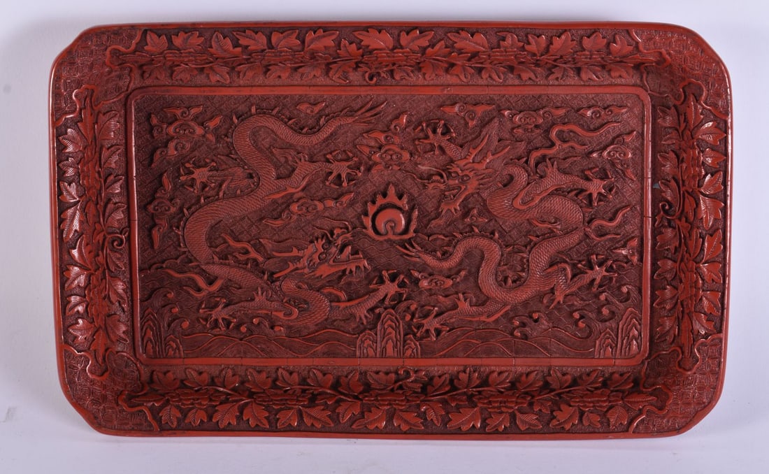 A CHINESE RED LACQUER DOUBLE DRAGON TRAY. 30 cm x 18 cm. (1 of 4)