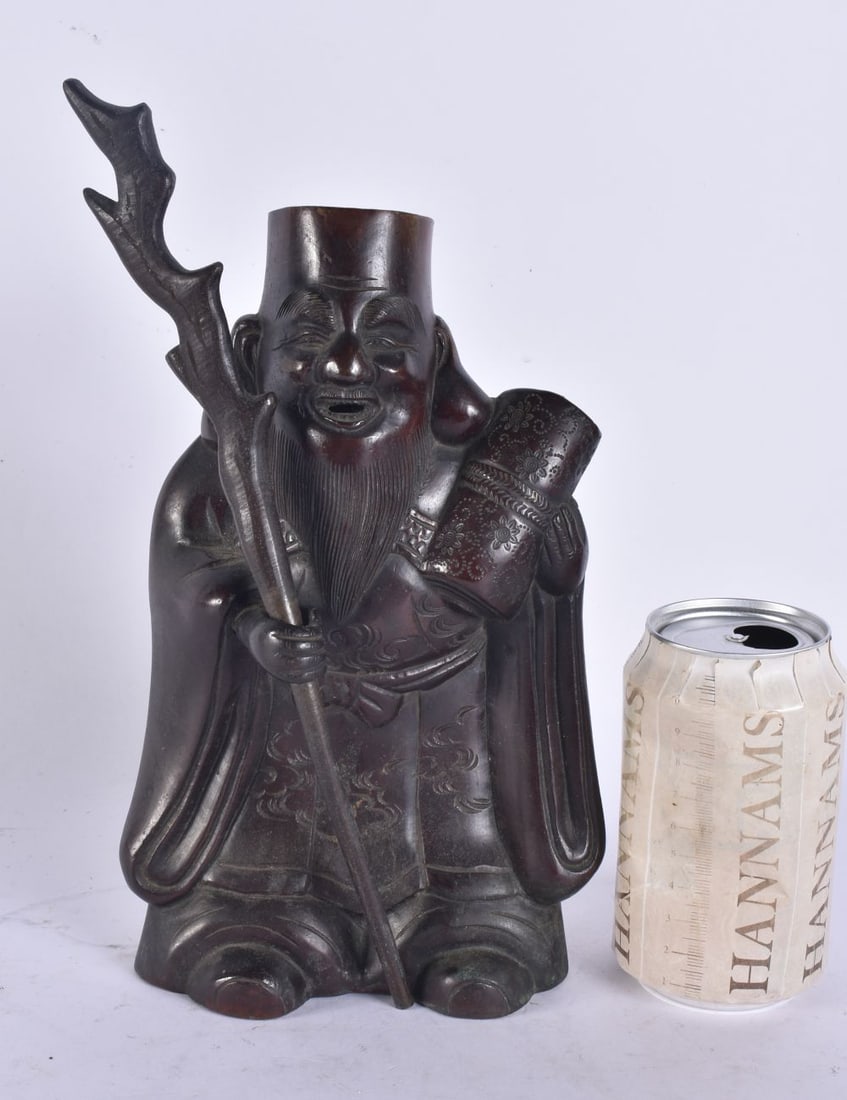 A 19TH CENTURY JAPANESE MEIJI PERIOD BRONZE FIGURE OF AN IMMORTAL. 28 cm high. (1 of 5)