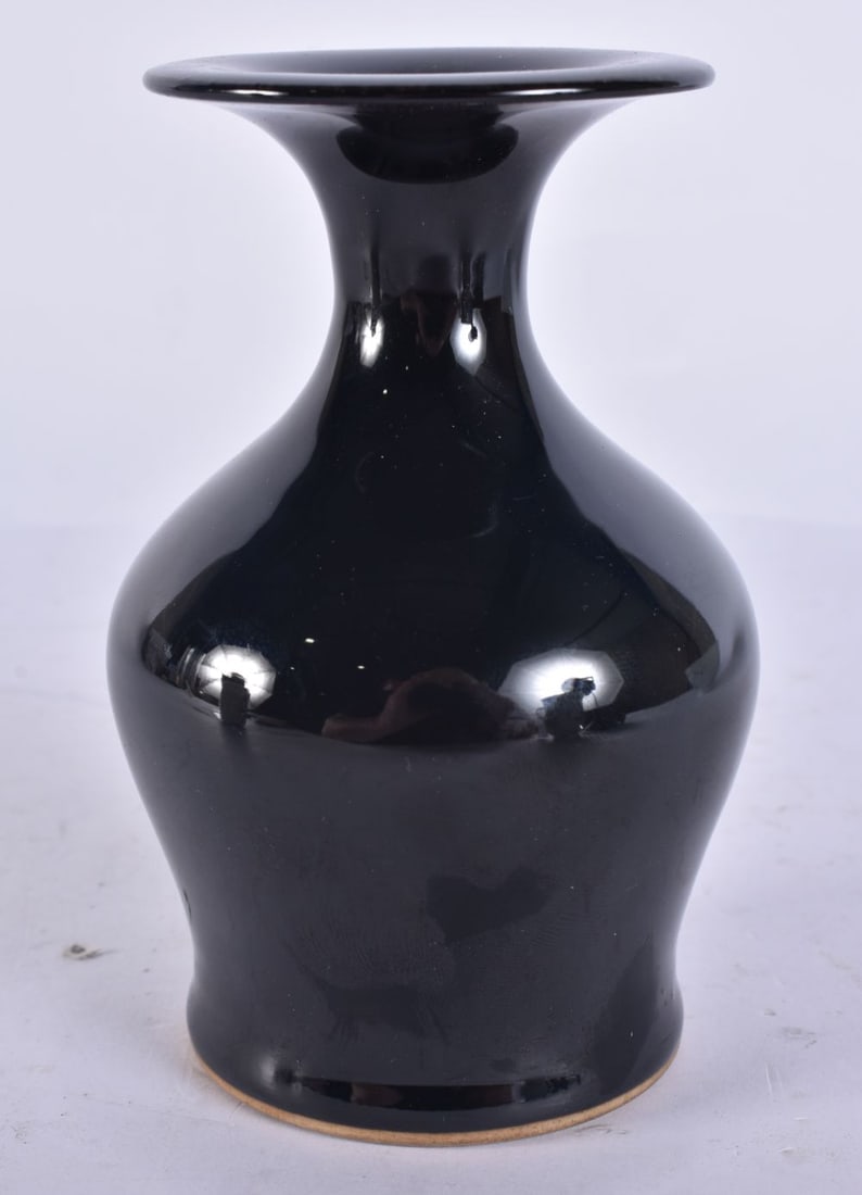 A CHINESE BROWN GLAZED PORCELAIN VASE. 13 cm high. (1 of 4)