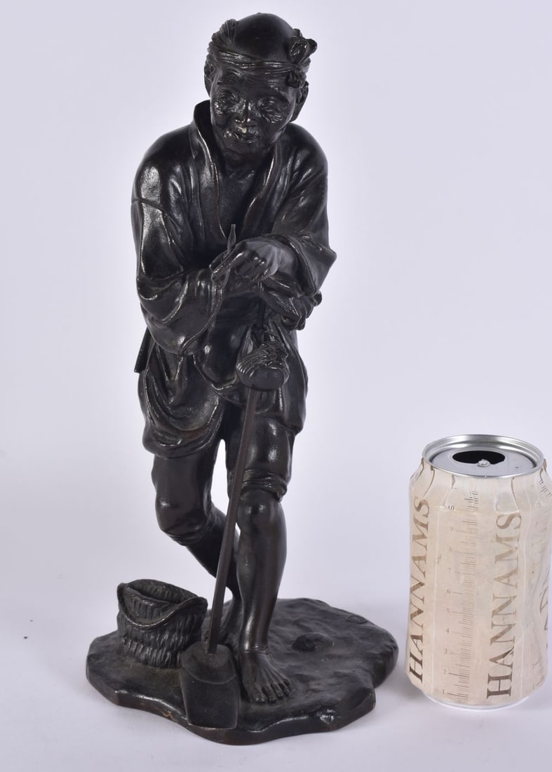 A 19TH CENTURY JAPANESE MEIJI PERIOD BRONZE OKIMONO. 33 cm high. (1 of 6)