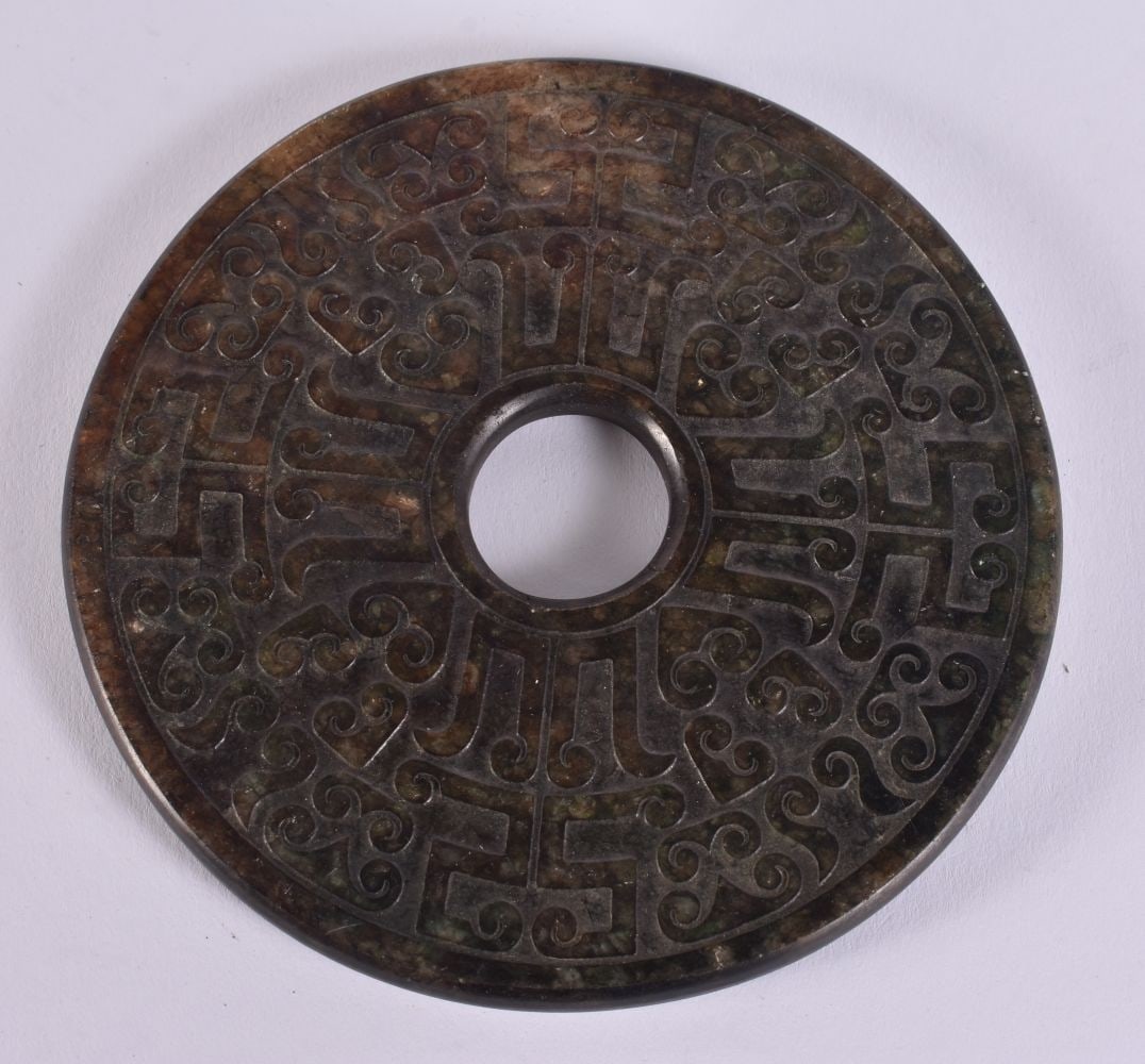 A CHINESE HARDSTONE BI DISC. 12 cm wide. (1 of 3)