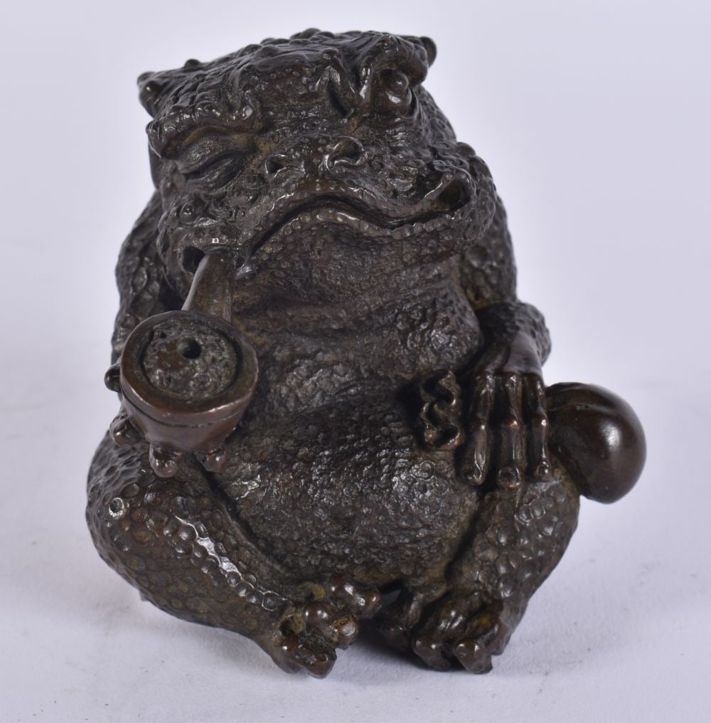 A JAPANESE BRONZE SMOKING TOAD. 9 cm x 5.5 cm. (1 of 4)