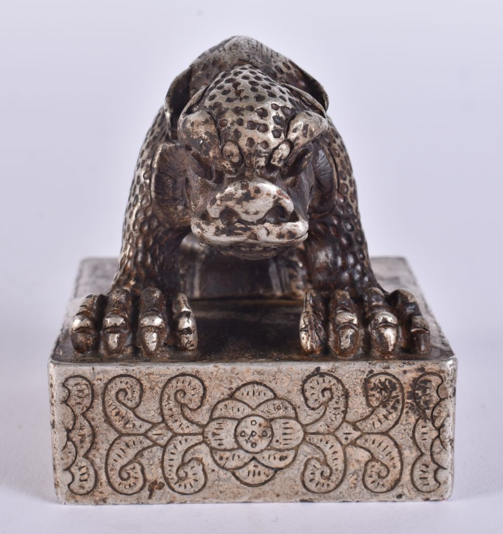 A CHINESE SILVERED BRONZE BEAST SEAL. 6 cm square. (1 of 5)