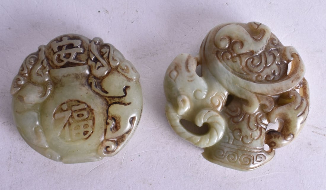 Two Carved Hardstone Roundels. Largest 5.5cm diameter (2) (1 of 2)