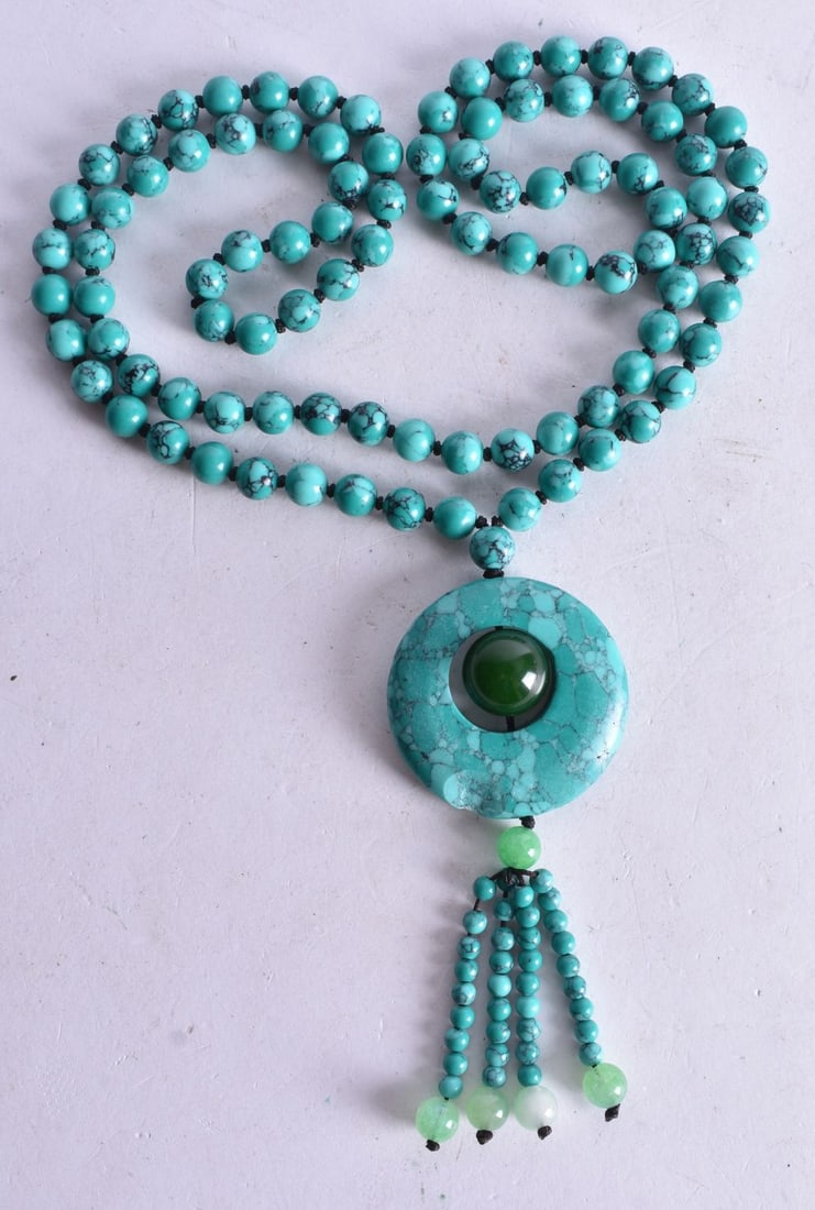 A Pendant Beaded Necklace. Necklace 88cm long, Largest Bead 8mm. Pendant 10cm long (1 of 3)