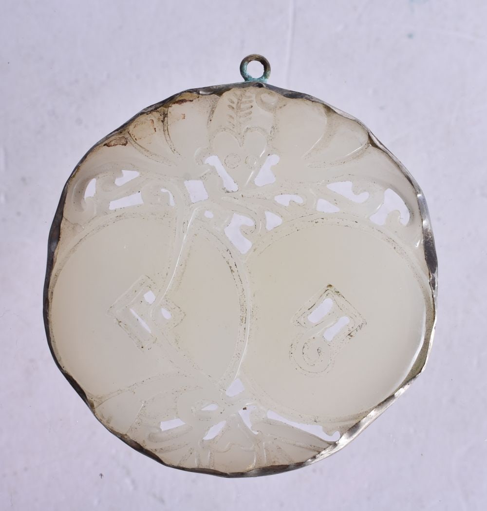 A Hardstone Pendant. 5cm diameter (1 of 3)