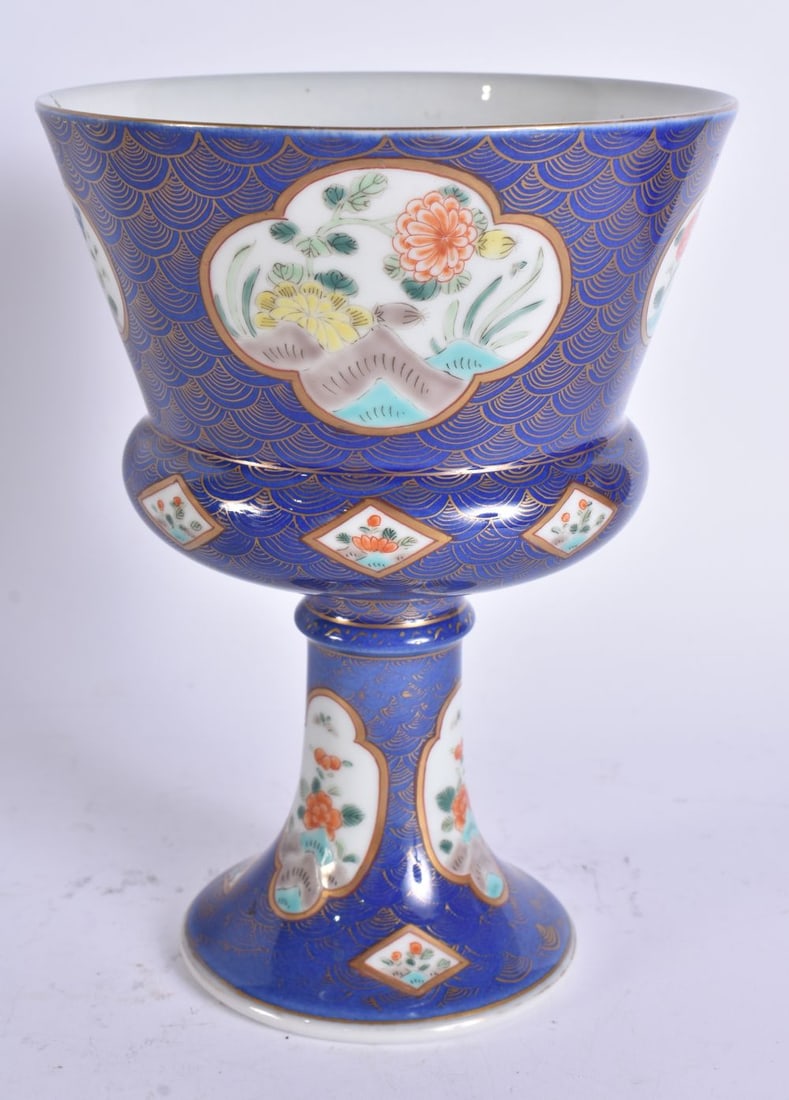 AN EARLY 20TH CENTURY JAPANESE MEIJI PERIOD PORCELAIN STEM FOOT CUP painted with flowers. 18.5 cm x: AN EARLY 20TH CENTURY JAPANESE MEIJI PERIOD PORCELAIN STEM FOOT CUP painted with flowers. 18.5 cm x 14 cm.