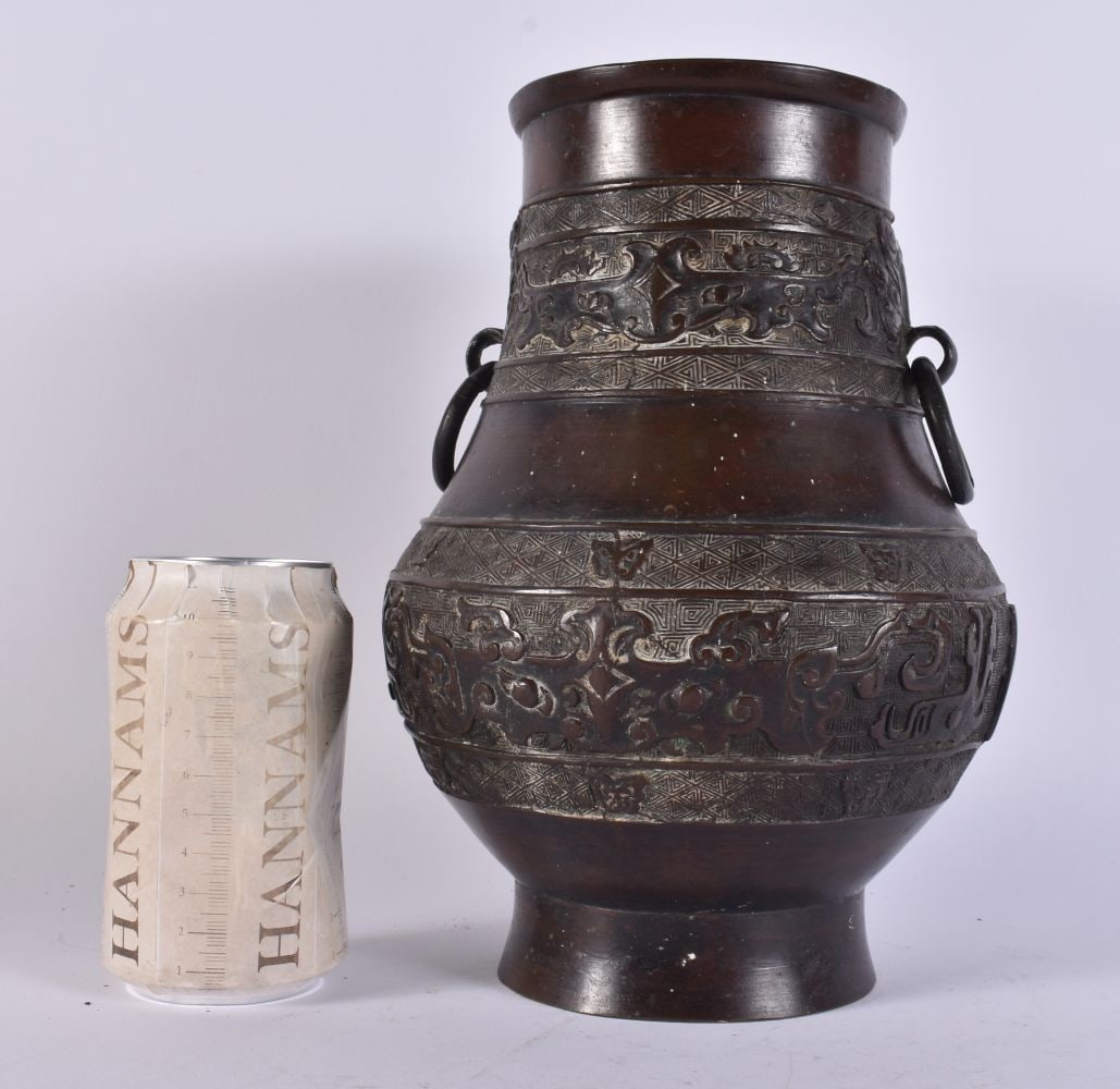 AN 18TH/19TH CENTURY CHINESE TWIN HANDLED BRONZE VASE bearing Xuande marks to base. 24.5 cm x 15 cm. (1 of 5)