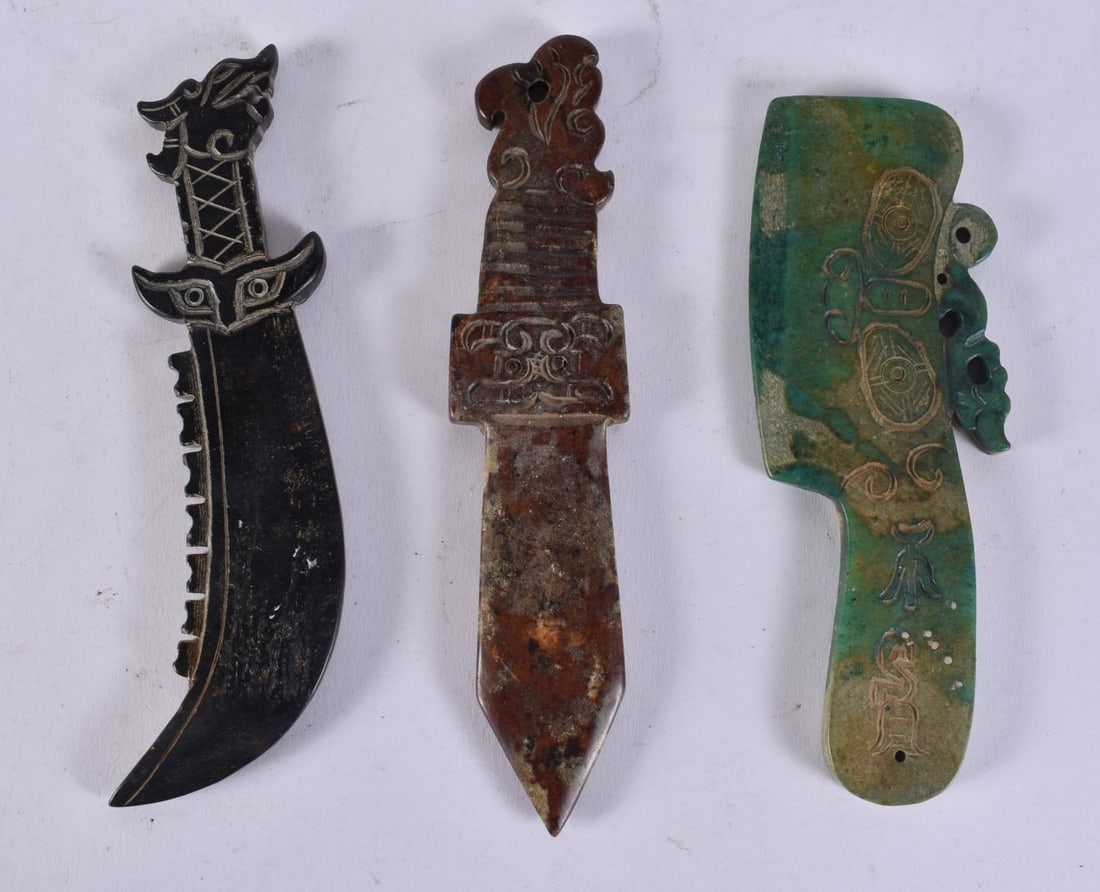 THREE CHINESE ARCHAIC STYLE STONE DAGGERS. 17 cm wide. (3) (1 of 2)