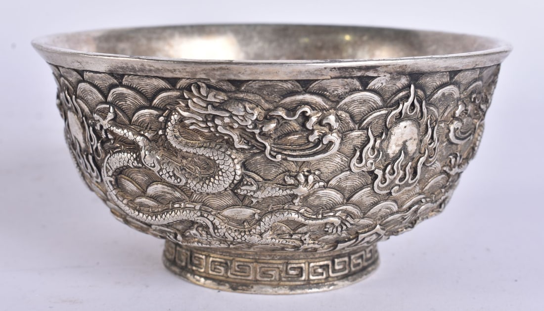 A CHINESE WHITE METAL DRAGON BOWL. 12 cm wide. (1 of 4)
