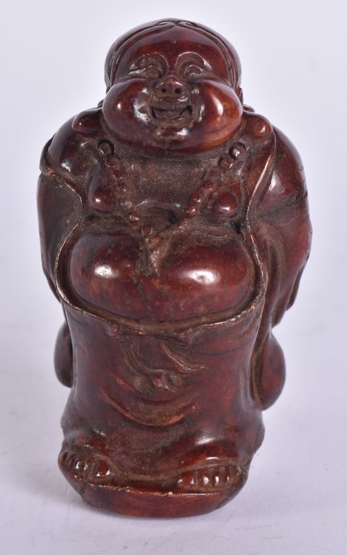 A CHINESE STONE FIGURE OF A BUDDHA. 8.5 cm high. (1 of 4)