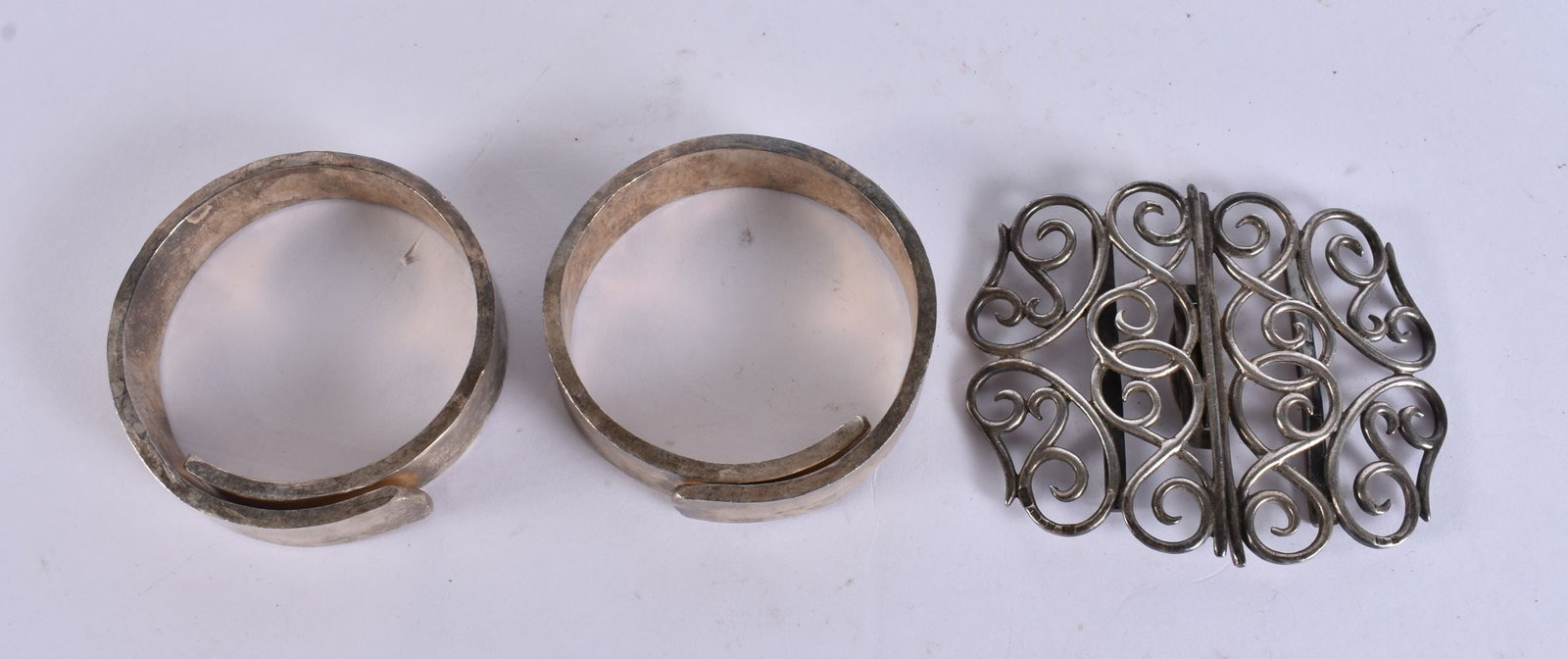 TWO WHITE METAL BRACELETS and a buckle. 303 grams. (3) (1 of 5)