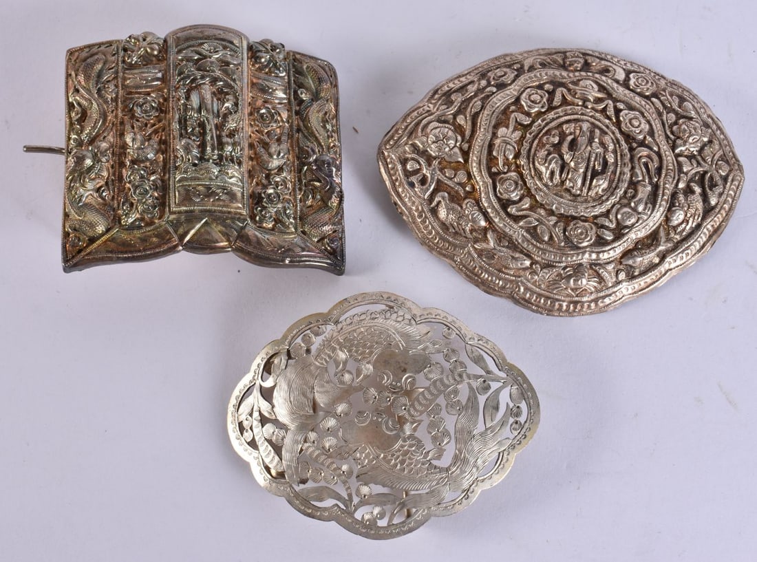 THREE EASTERN WHITE METAL BUCKLES. 112 grams. Largest 10 cm x 6.5 cm. (3) (1 of 5)