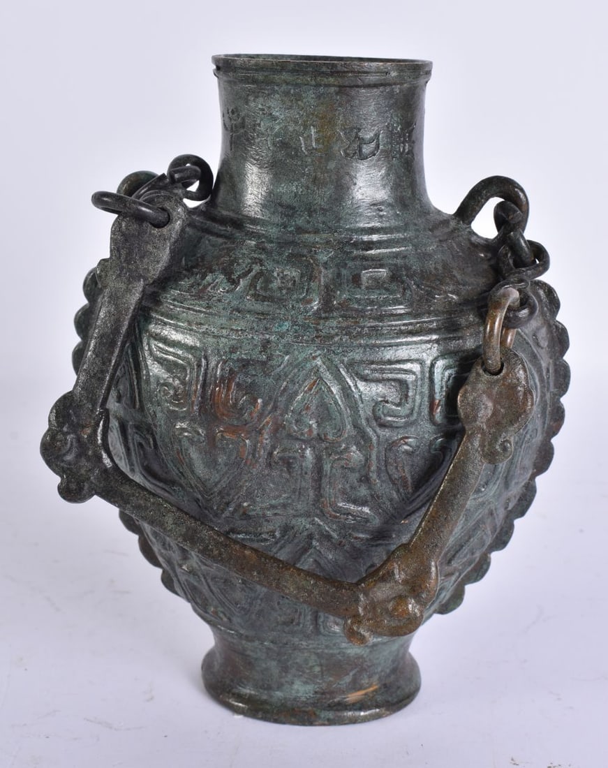 AN ARCHAIC BRONZE VASE ON CHAIN. 18 cm high excluding chain. (1 of 6)