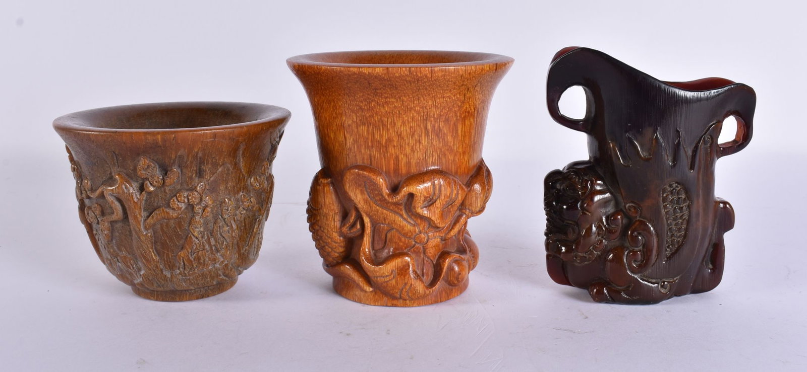 THREE CHINESE HORN TYPE LIBATION CUPS. Largest 10.5 cm high. (?): THREE CHINESE HORN TYPE LIBATION CUPS. Largest 10.5 cm high. (?)