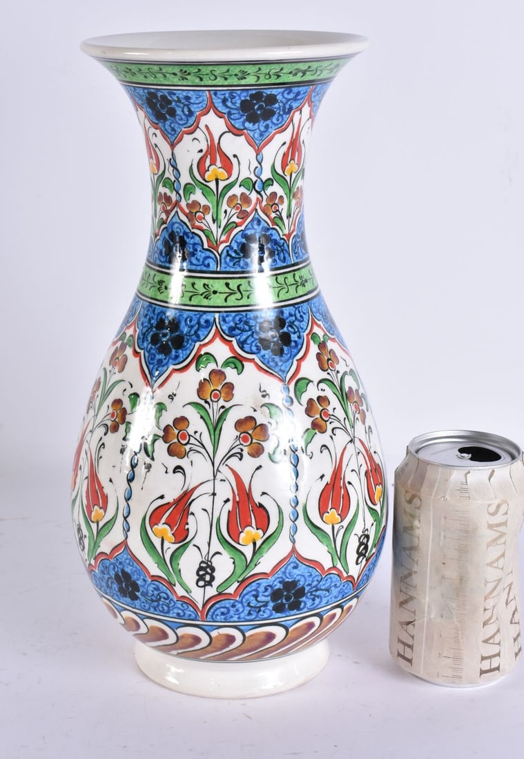 A TURKISH IZNIK VASE. 30 cm high. (1 of 4)